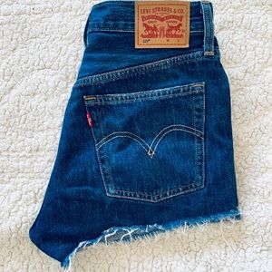 501 Levis ripped shorts